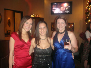 Ashley Pitt, Connie Mercado, and Kim Stangle enjoy a C&P holiday party