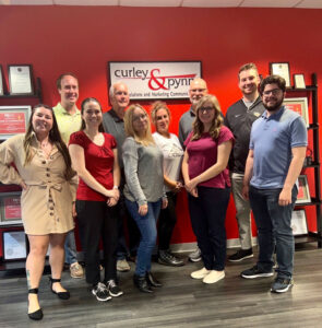 Curley & Pynn team in a new downtown Orlando office