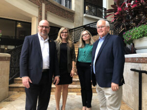 Curley & Pynn leaders gather after the 2019 FPRA Orlando Area Chapter board installation, where Kacie Escobar was recognized as Member of the Year.