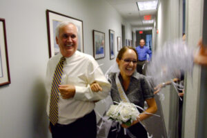 Roger Pynn walks Elizabeth Buccianti “down the aisle”
