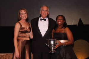 Co-founder Roger Pynn accepts the John W. Dillin Award