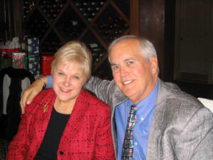 Shelley and Roger Pynn enjoy a Curley & Pynn holiday party.